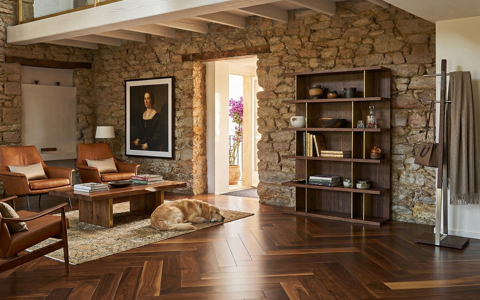 Dark herringbone room with stone walls and tailored furniture